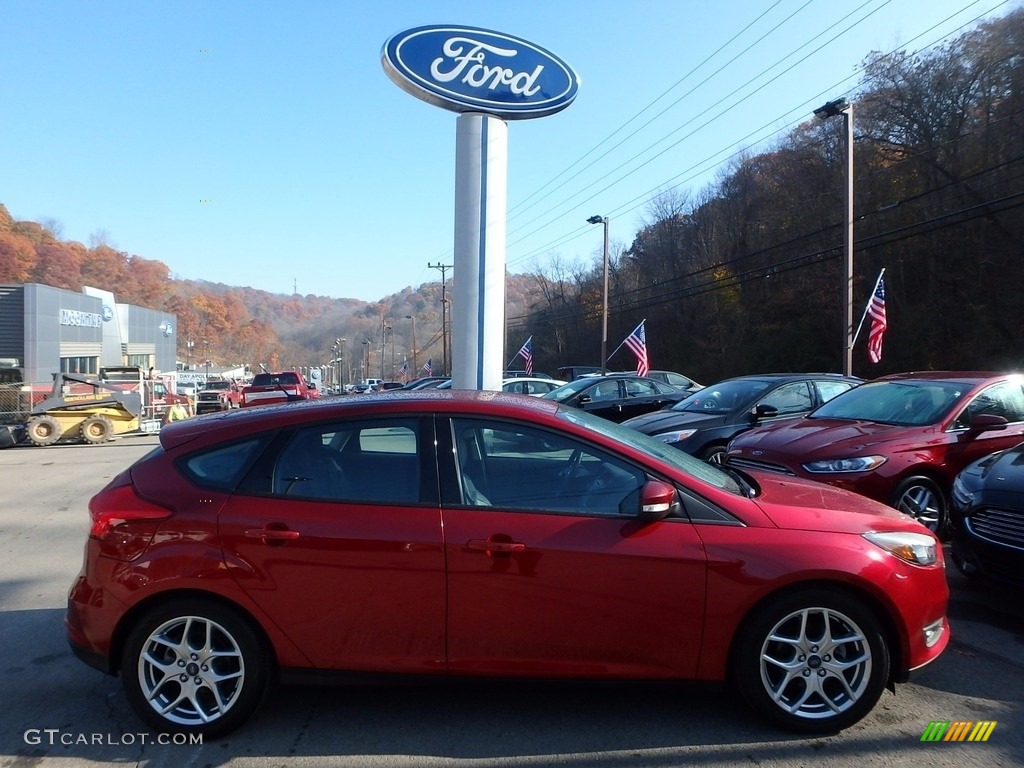 2015 Focus SE Hatchback - Ruby Red Metallic / Charcoal Black photo #1