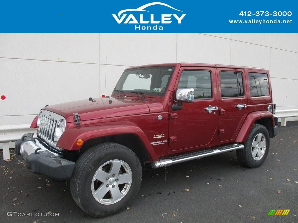 2011 Wrangler Unlimited Sahara 4x4 - Deep Cherry Red / Black/Dark Saddle photo #1