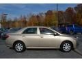 2010 Desert Sand Metallic Toyota Corolla LE  photo #2