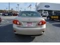 2010 Desert Sand Metallic Toyota Corolla LE  photo #4