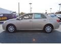 2010 Desert Sand Metallic Toyota Corolla LE  photo #6