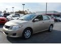 2010 Desert Sand Metallic Toyota Corolla LE  photo #7
