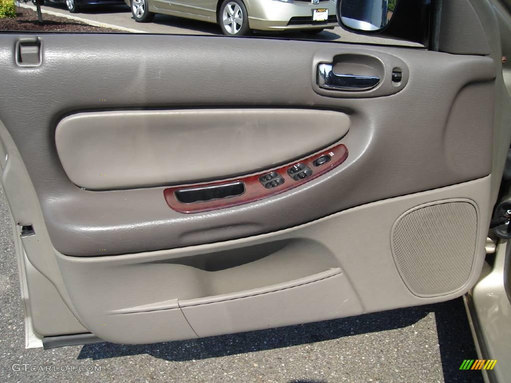 2002 Sebring LXi Sedan - Light Almond Pearl Metallic / Sandstone photo #20