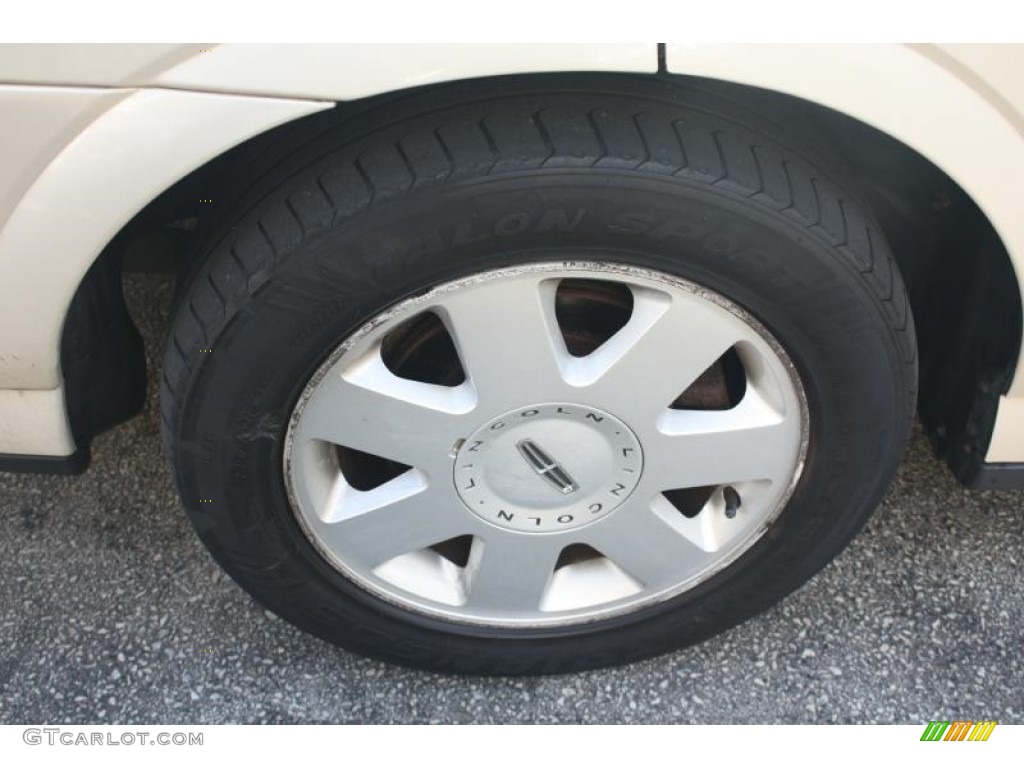 2003 LS V6 - Ivory Parchment Metallic / Black photo #14