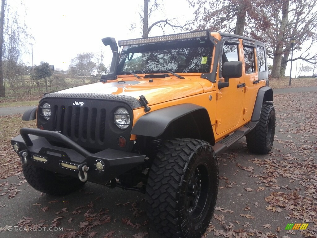 2012 Wrangler Unlimited Sport 4x4 - Dozer Yellow / Black photo #2