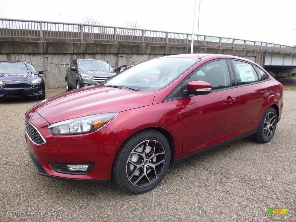 Ruby Red 2017 Ford Focus SEL Sedan Exterior Photo #117487361