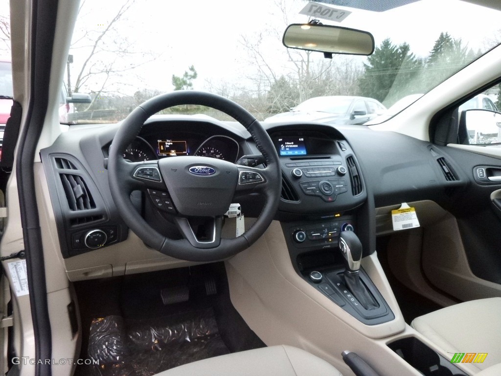 Medium Light Stone Interior 2017 Ford Focus SE Sedan Photo #117516289