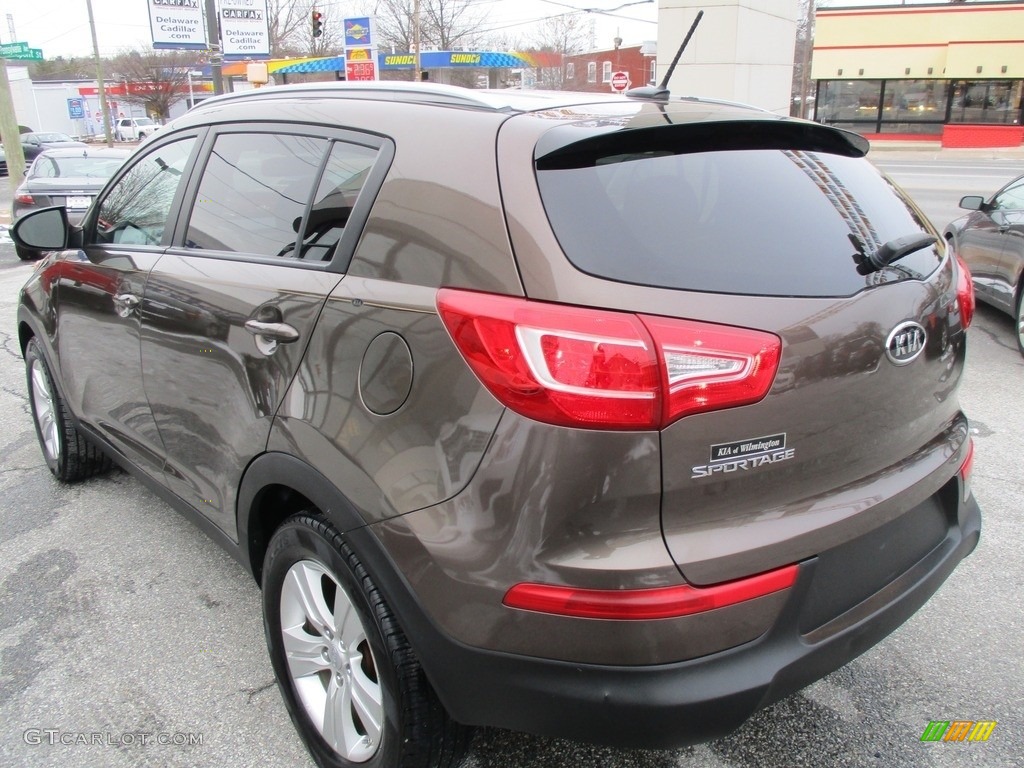2011 Sportage LX - Sand Track / Black photo #4