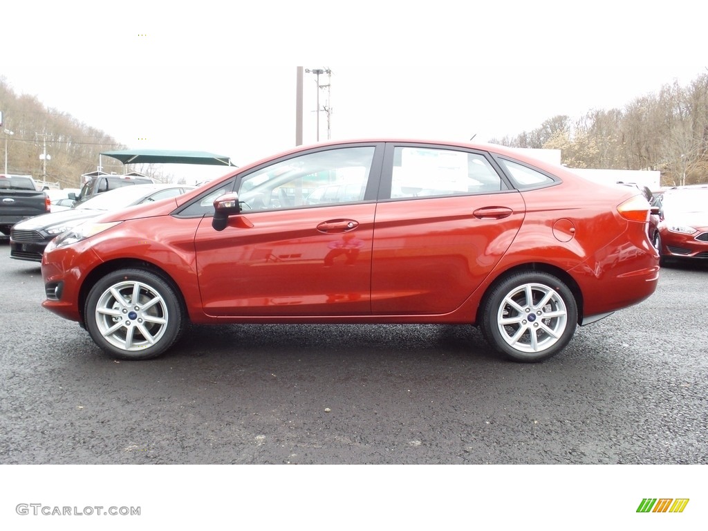 2016 Fiesta SE Sedan - Ruby Red Metallic / Charcoal Black photo #1