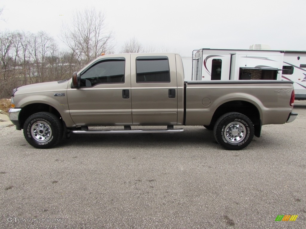 2004 F250 Super Duty XLT Crew Cab 4x4 - Arizona Beige Metallic / Medium Parchment photo #1