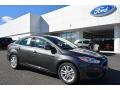 2017 Magnetic Ford Focus SE Sedan  photo #1