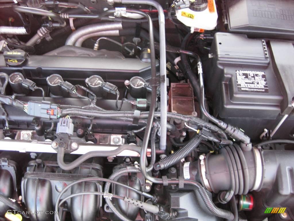 2006 Focus ZX5 SES Hatchback - Dark Toreador Red Metallic / Charcoal/Charcoal photo #13