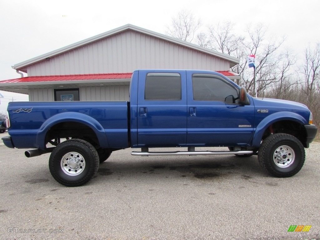 2003 F350 Super Duty XLT Crew Cab 4x4 - Sonic Blue Metallic / Black photo #3