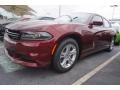 2017 Octane Red Dodge Charger SE  photo #1