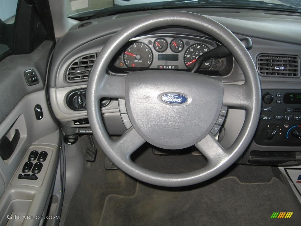 2004 Taurus SE Sedan - Silver Frost Metallic / Medium Graphite photo #4