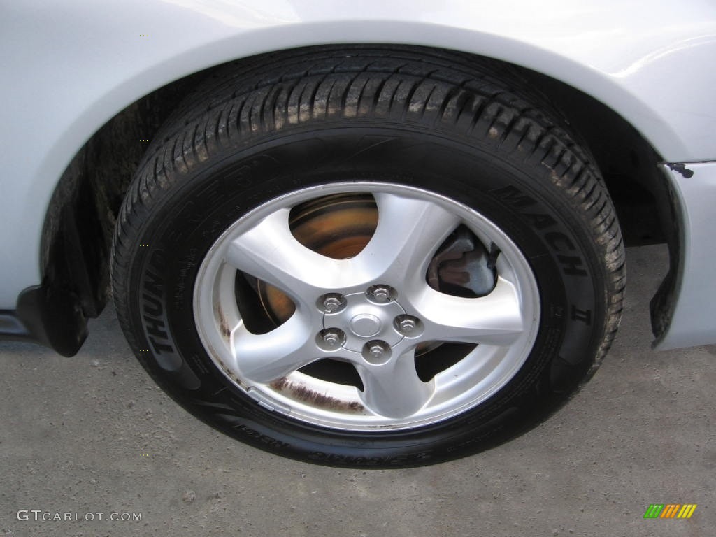 2004 Taurus SE Sedan - Silver Frost Metallic / Medium Graphite photo #17
