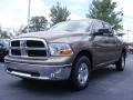 2009 Austin Tan Pearl Dodge Ram 1500 SLT Quad Cab  photo #1