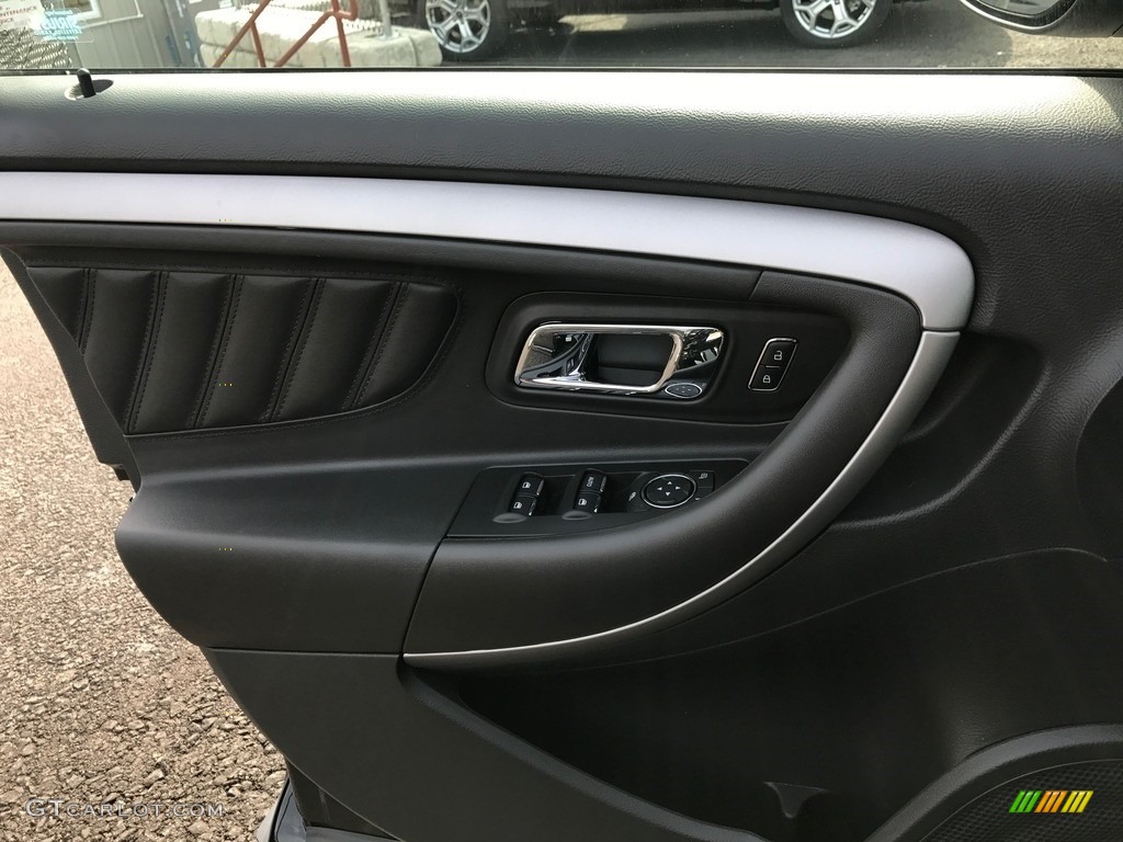 2017 Ford Taurus SEL AWD Charcoal Black Door Panel Photo #119378887