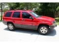 1999 Flame Red Jeep Grand Cherokee Laredo 4x4  photo #9