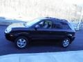 2005 Obsidian Black Hyundai Tucson GL  photo #7