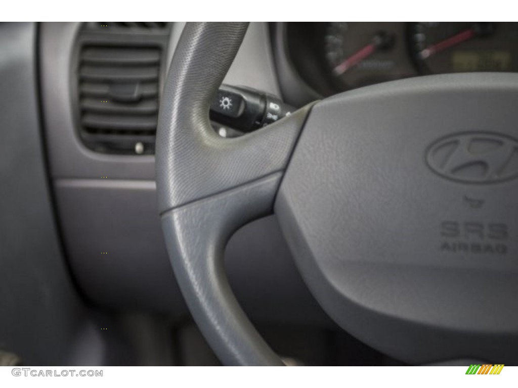 2004 Accent GL Coupe - Ebony Black / Gray photo #13
