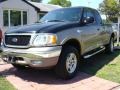 2003 Black Ford F150 Heritage Edition Supercab 4x4  photo #1