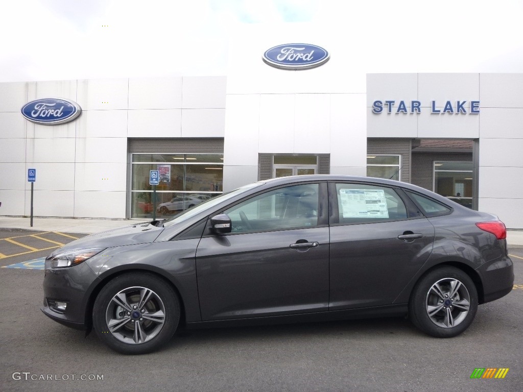 2017 Focus SE Sedan - Magnetic / Charcoal Black photo #1