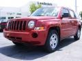 2009 Inferno Red Crystal Pearl Jeep Patriot Sport  photo #1