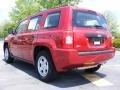 2009 Inferno Red Crystal Pearl Jeep Patriot Sport  photo #2