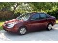 2006 Dark Toreador Red Metallic Ford Focus ZX4 SE Sedan  photo #2