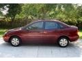 2006 Dark Toreador Red Metallic Ford Focus ZX4 SE Sedan  photo #5