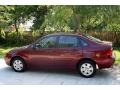 2006 Dark Toreador Red Metallic Ford Focus ZX4 SE Sedan  photo #6