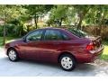 2006 Dark Toreador Red Metallic Ford Focus ZX4 SE Sedan  photo #7