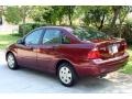 2006 Dark Toreador Red Metallic Ford Focus ZX4 SE Sedan  photo #8