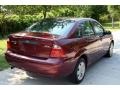 2006 Dark Toreador Red Metallic Ford Focus ZX4 SE Sedan  photo #11