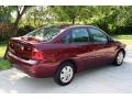 2006 Dark Toreador Red Metallic Ford Focus ZX4 SE Sedan  photo #12