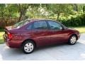 2006 Dark Toreador Red Metallic Ford Focus ZX4 SE Sedan  photo #13