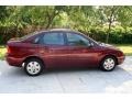 2006 Dark Toreador Red Metallic Ford Focus ZX4 SE Sedan  photo #14