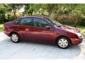 2006 Dark Toreador Red Metallic Ford Focus ZX4 SE Sedan  photo #16