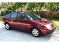 2006 Dark Toreador Red Metallic Ford Focus ZX4 SE Sedan  photo #17