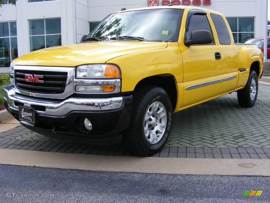 2005 Sierra 1500 Z71 Extended Cab 4x4 - Flame Yellow / Dark Pewter photo #1