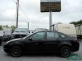 2010 Ebony Black Ford Focus SES Sedan  photo #2