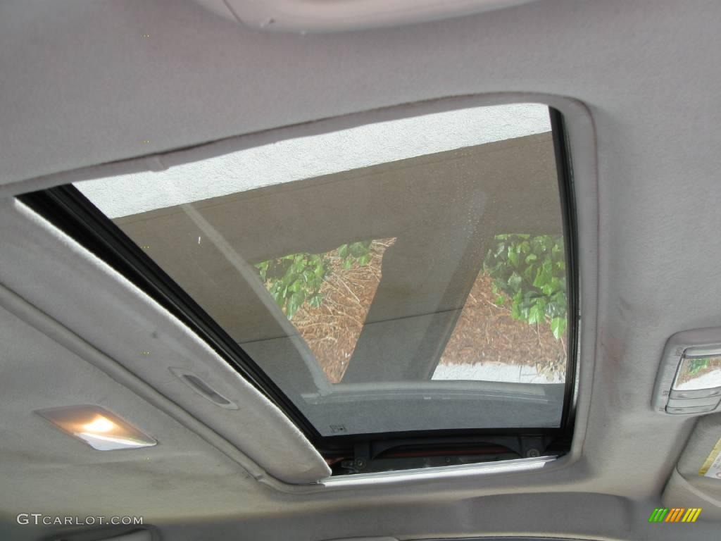 2004 Vibe AWD - Fusion Orange Metallic / Graphite photo #9