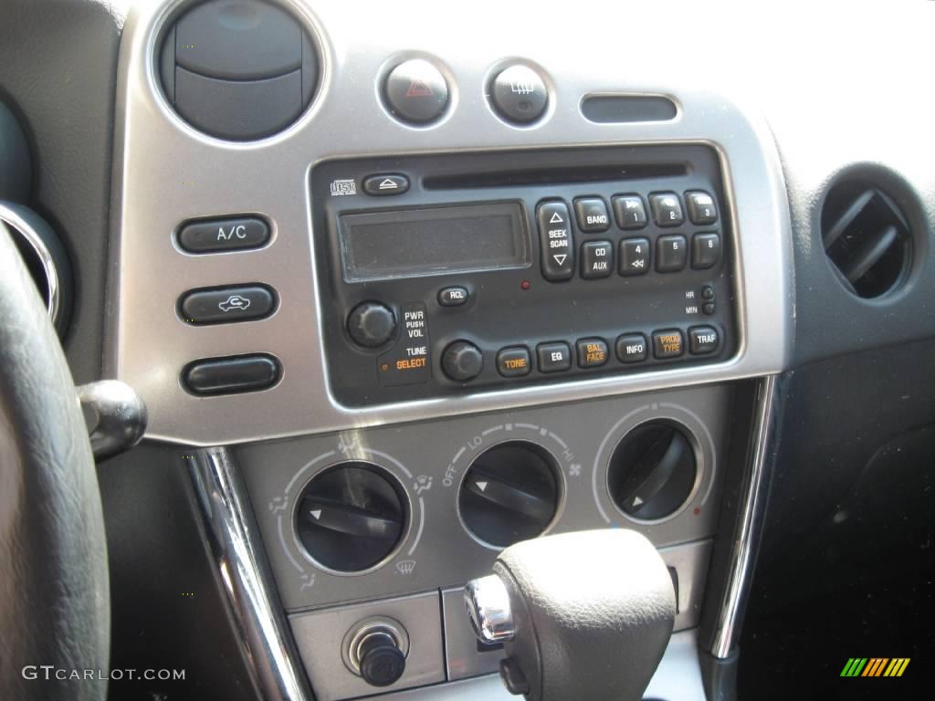 2004 Vibe AWD - Fusion Orange Metallic / Graphite photo #10