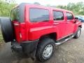 2009 Victory Red Hummer H3   photo #3