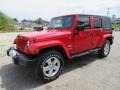 2010 Flame Red Jeep Wrangler Unlimited Sahara 4x4  photo #1