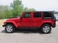 2010 Flame Red Jeep Wrangler Unlimited Sahara 4x4  photo #3