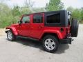 2010 Flame Red Jeep Wrangler Unlimited Sahara 4x4  photo #7