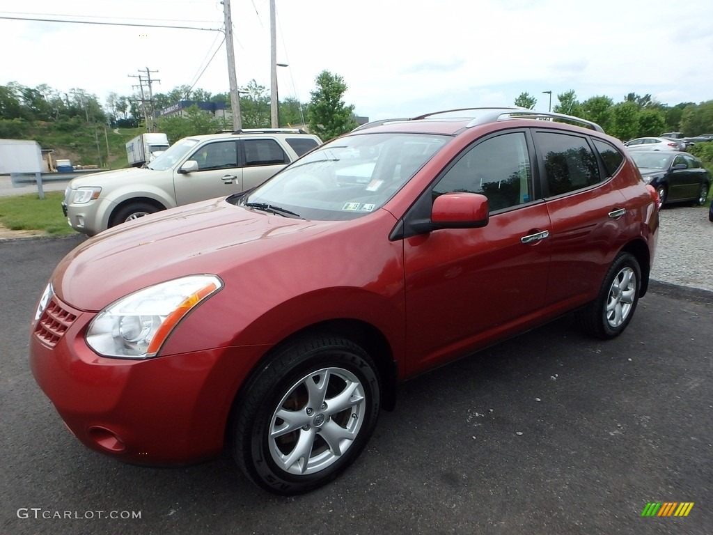 2010 Rogue SL AWD - Venom Red / Black photo #1