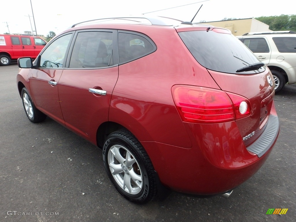 2010 Rogue SL AWD - Venom Red / Black photo #2